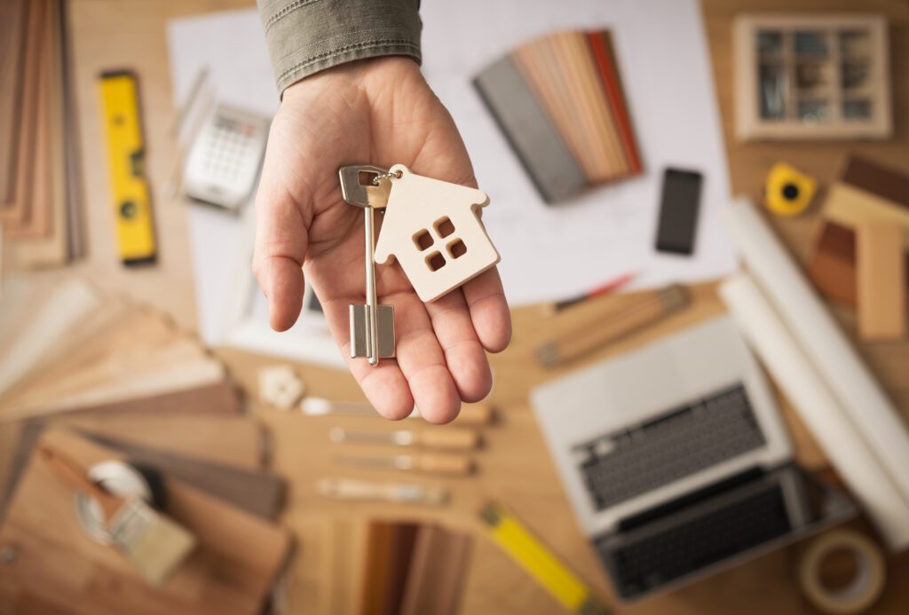 Real Estate Agent Handing Over a House Key